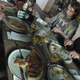 Diner. Note that Italian pizzas aren’t as suited to eating without utensils as the bulky American ones.